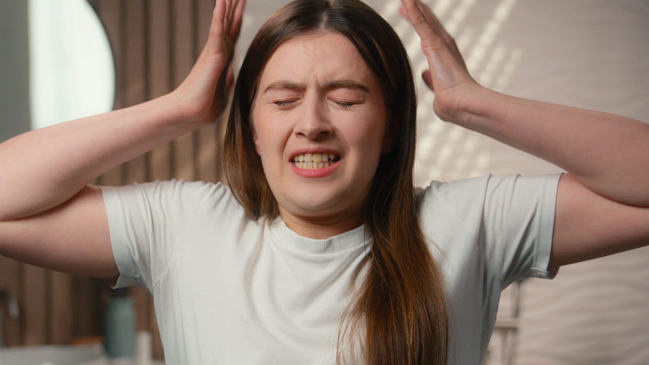 Woman experiencing anxiety symptoms needing panic disorder treatment