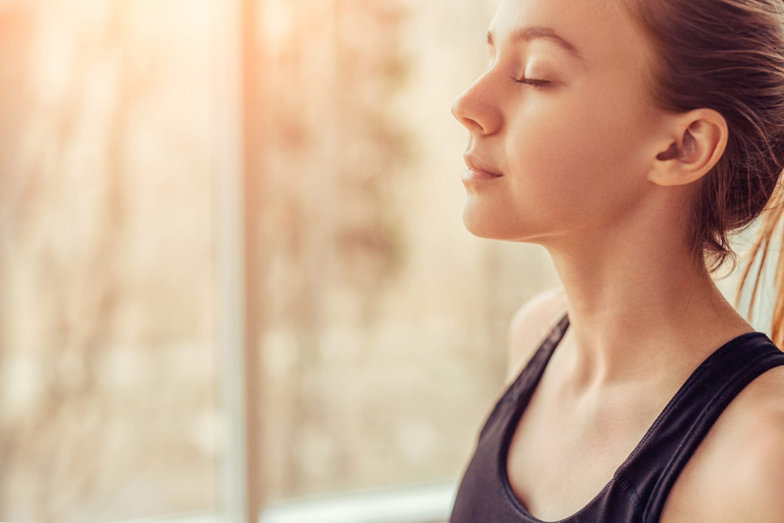 Somatic experiencing helps this individual access and address trauma that lingers in their body, allowing them to work through emotional symptoms such as shame.
